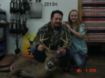 Man holding killed buck