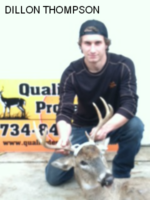 Man holding killed buck