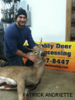 Man holding killed buck